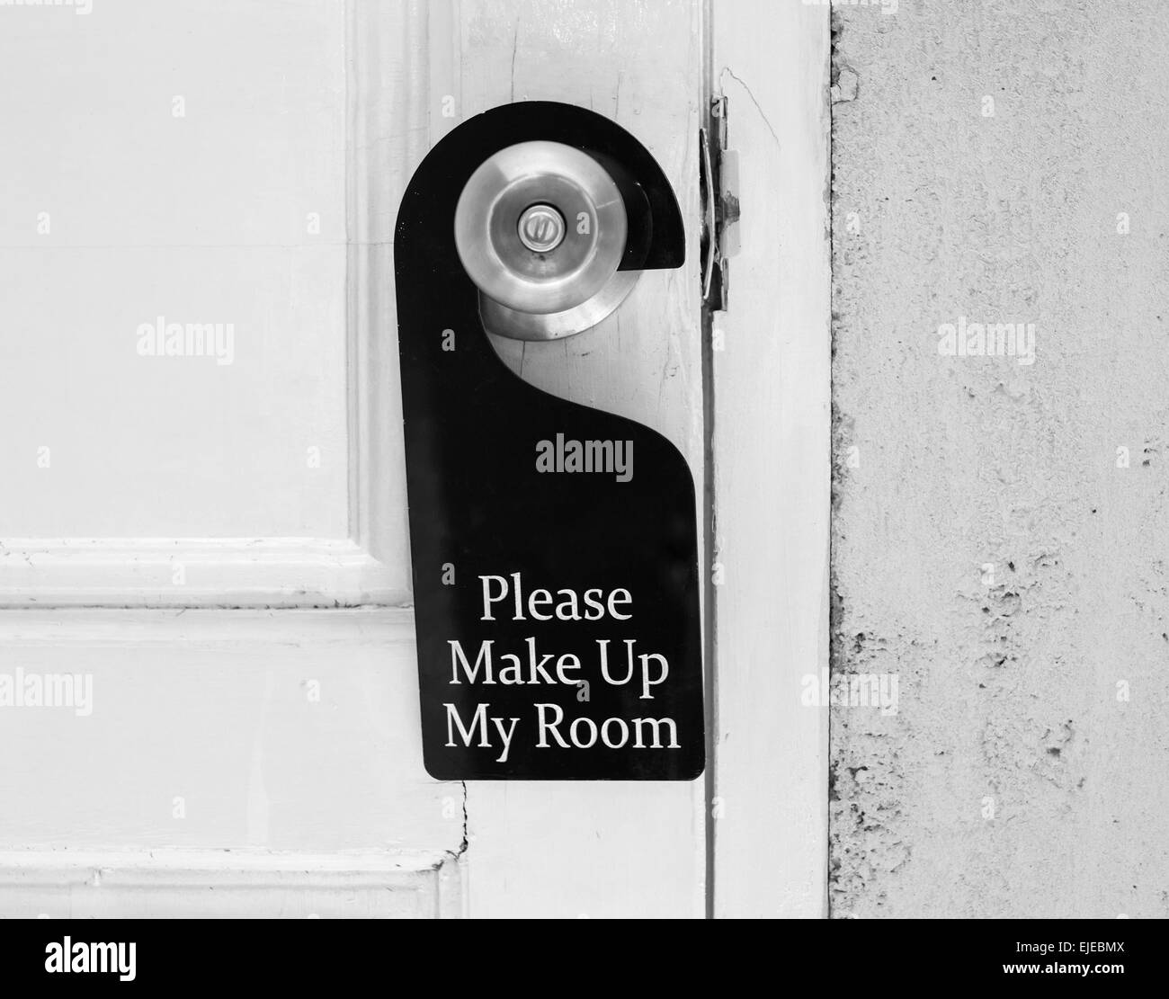 Please make up my room sign on door knob in hotel Stock Photo