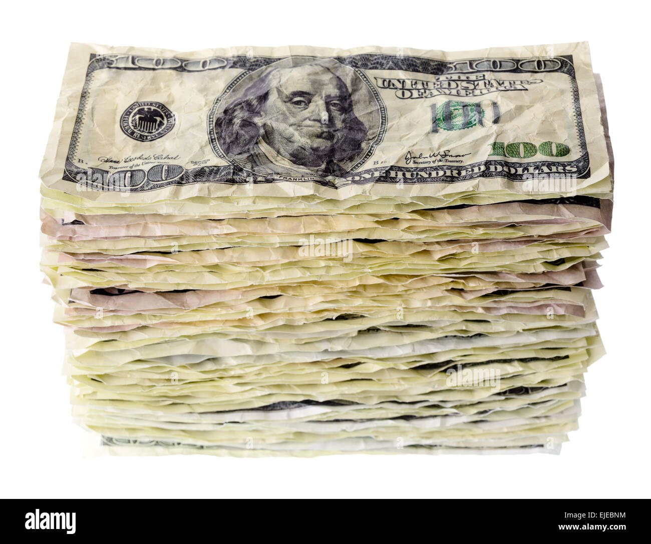 Money and finance: stack of old and crumpled one-hundred dollar bills, isolated on white background. Not a real banknotes. Stock Photo