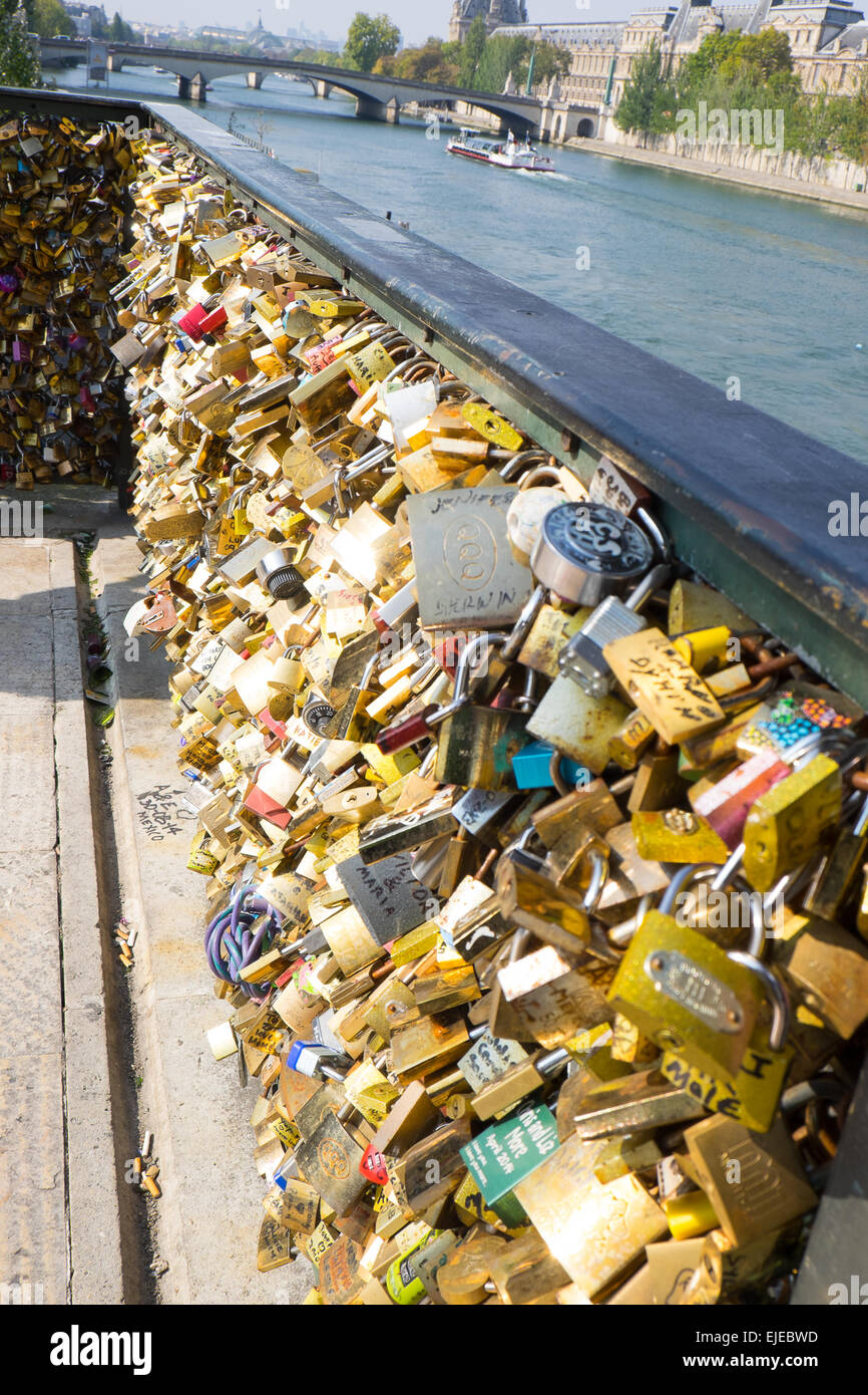 The Pont De Artes bridge in Paris, featuring many pad locks left by