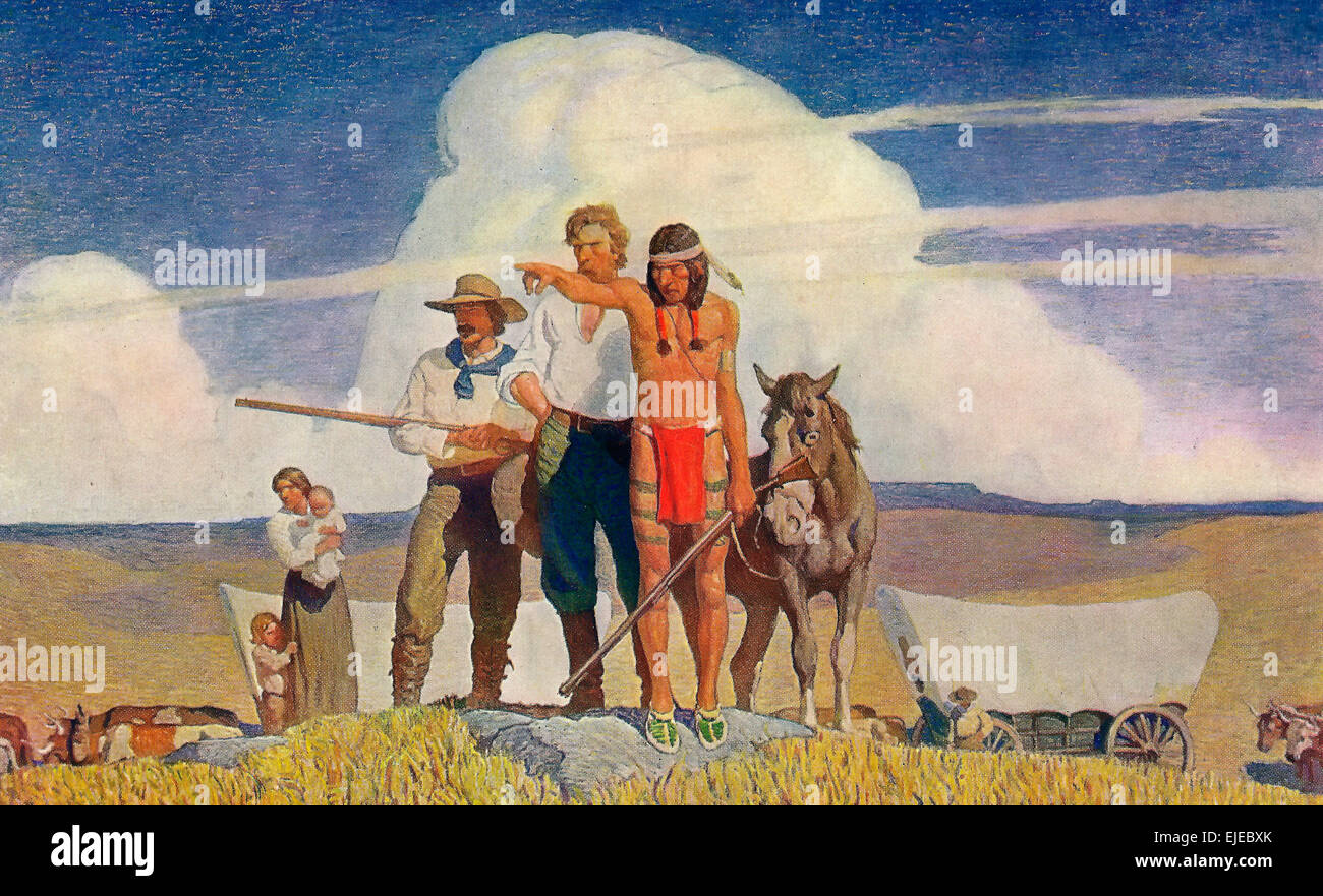 Pioneers - The Opening of the Prairies - Native American pointing the way to a wagon trains of pioneers  N.C Wyeth Stock Photo