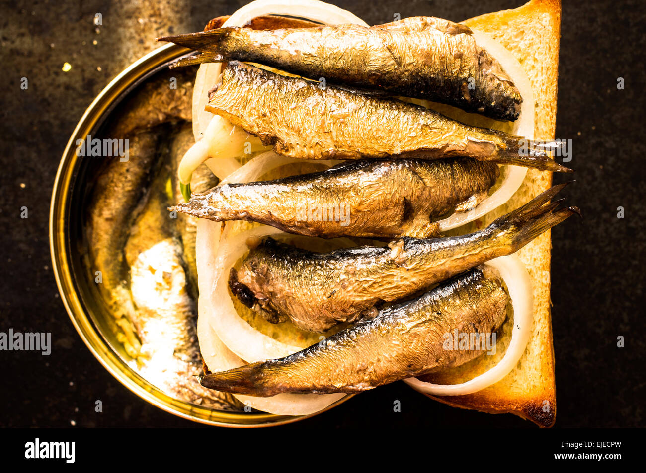Tapas with sardines or sprats on canned fish Stock Photo Alamy