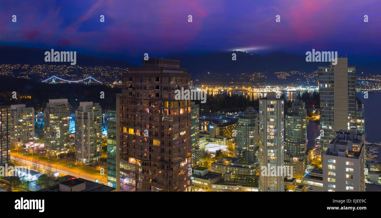 Vancouver British Columbia Canada Cityscape with Street Light Trails Stanley Park Grouse Mountain View at Dusk Stock Photo