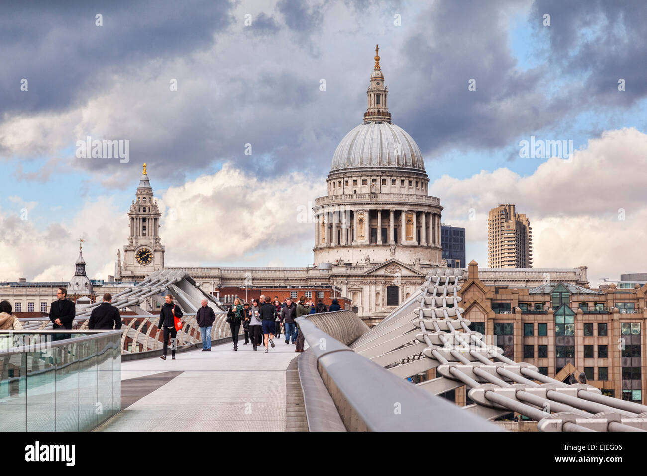 St Paul's Cathedral from the Millennium Bridge, London, England, under a dramatic sky. Stock Photo