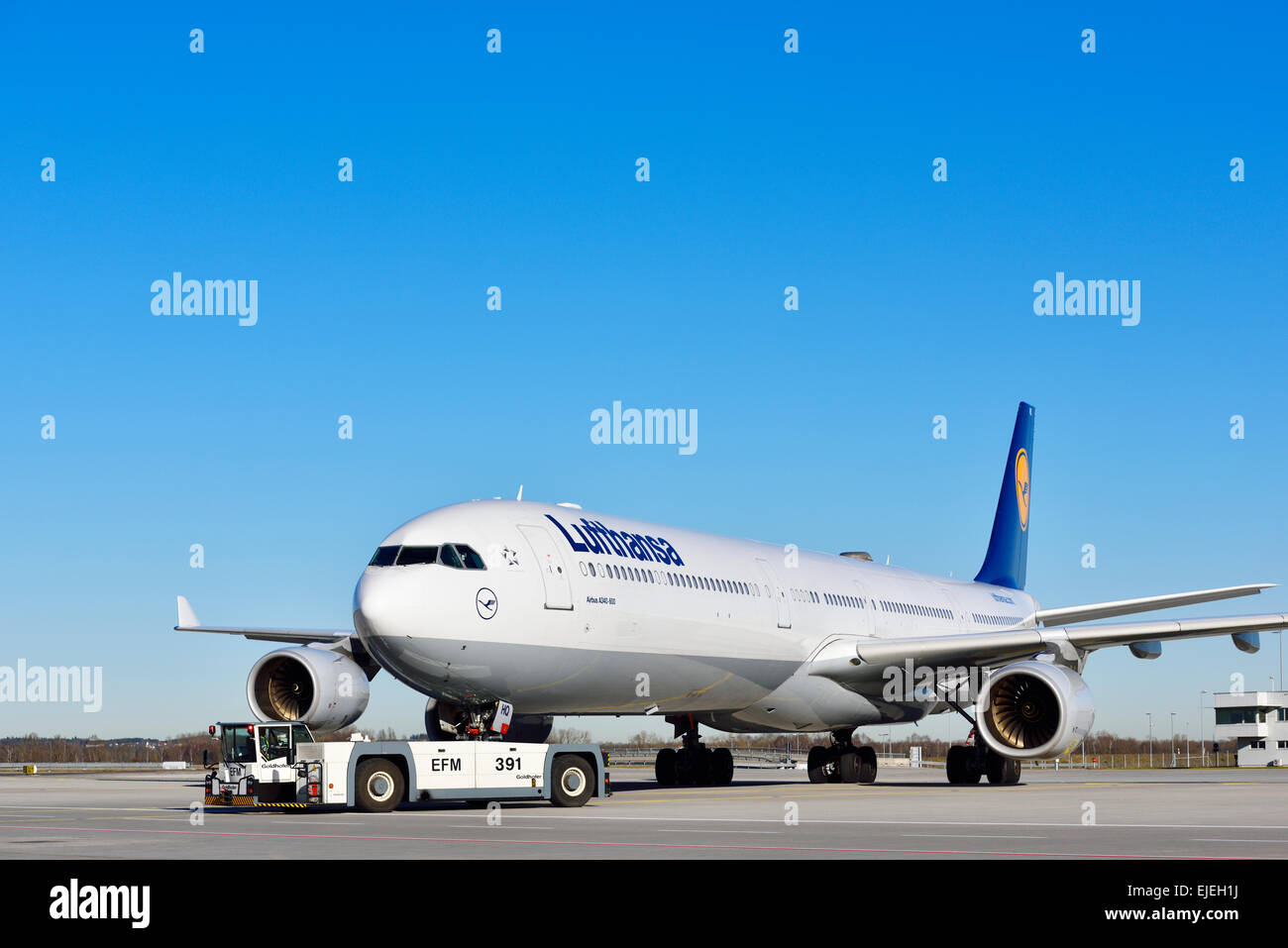 Lufthansa Airbus A340-600 with pushback truck, Terminal 2, Munich Airport, Freising, Erding, Erdinger Moos, Munich, Bavaria Stock Photo