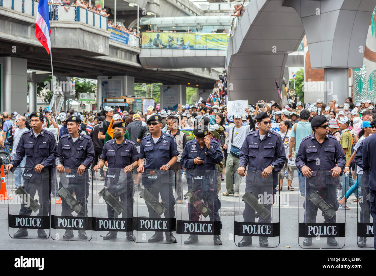 BANGKOK,THAILAND- JUNE 30 : Unidentified polices stand guard on pathumwan road during a Guy Fawkes anti-government rally on Jun  Stock Photo