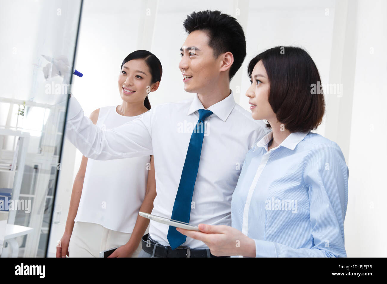 The young business people in office work Stock Photo - Alamy