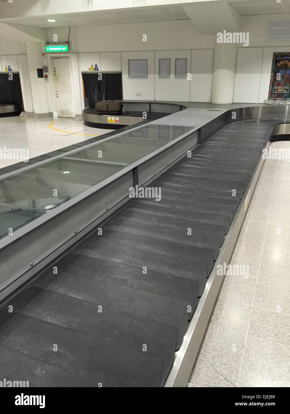 Manchester Airport Terminal three empty luggage conveyor belt Stock Photo