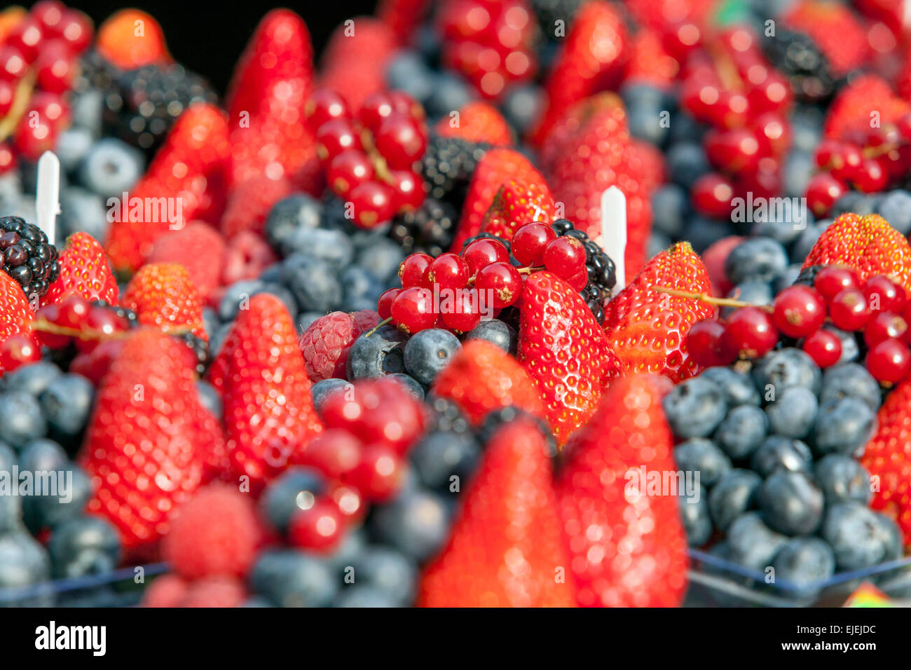 Strawberries and blueberries, mixed berries Close up Tasty Sweet fruits Stock Photo