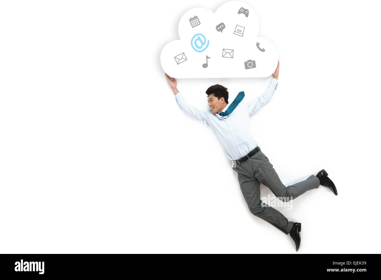 The business man holding a cloud on a white background on the fly Stock ...