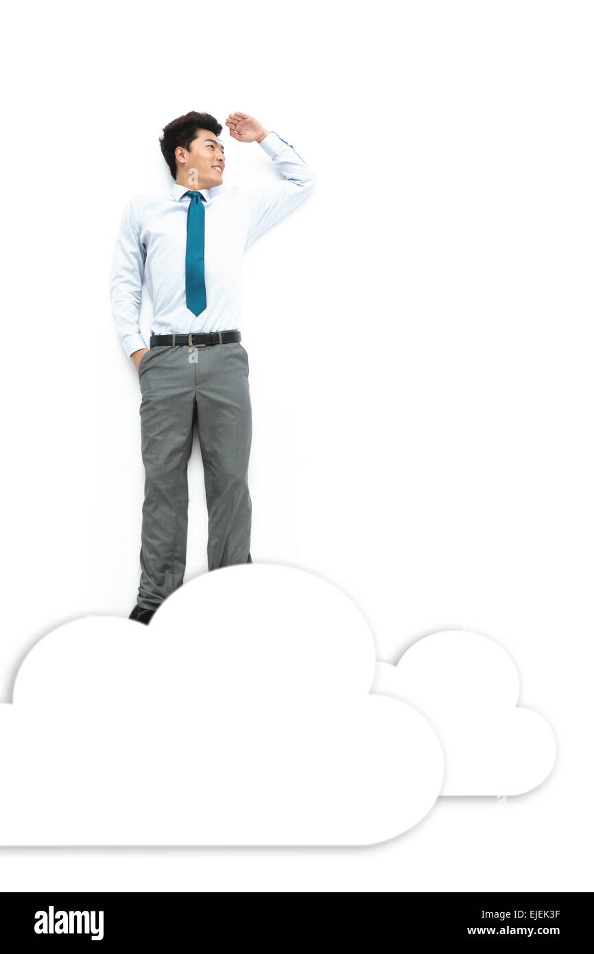 A young business man looked on the cloud Stock Photo - Alamy