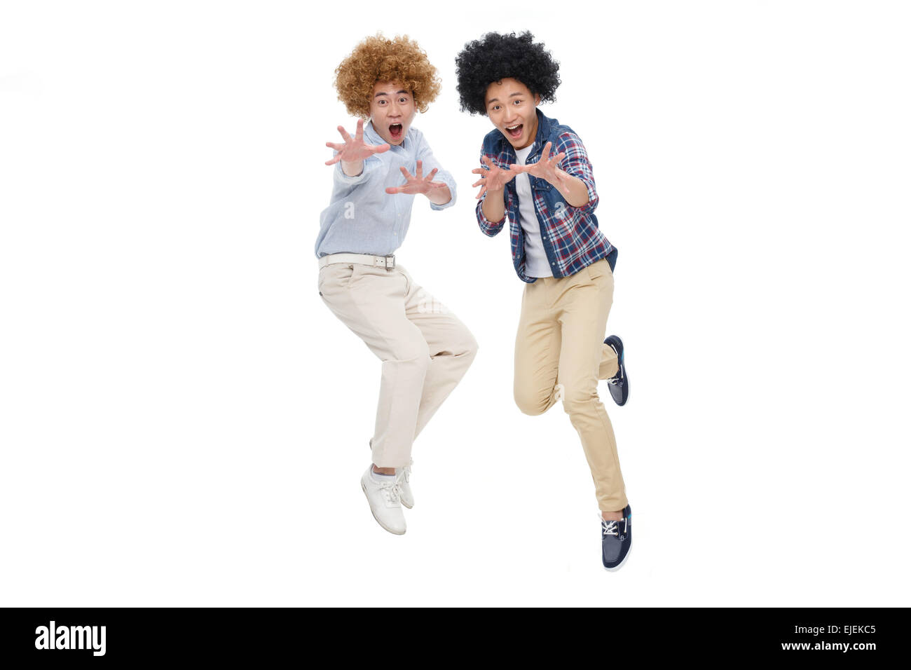 Young people dance with a wig Stock Photo Alamy