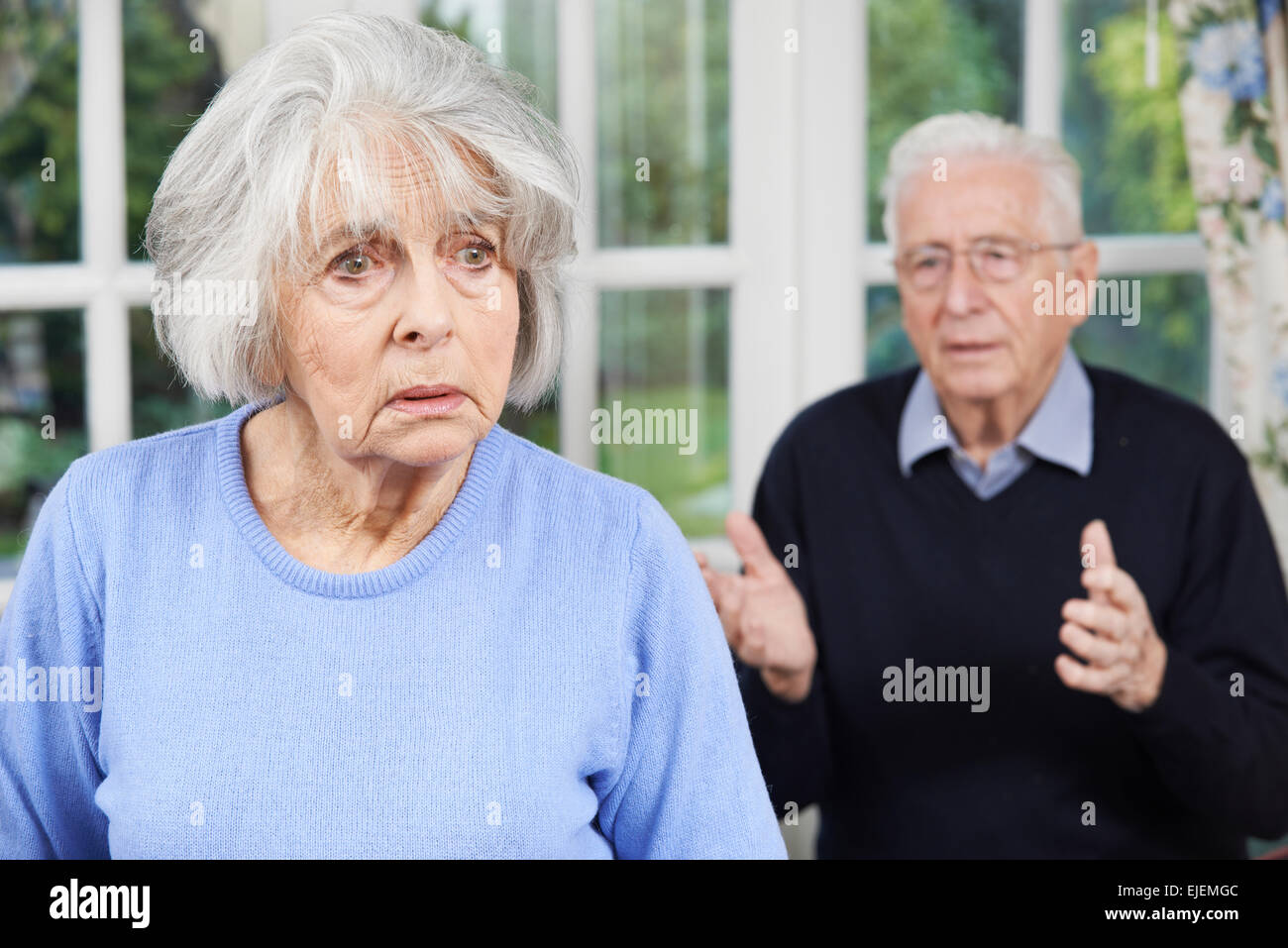 Unhappy Senior Couple At Home Together Stock Photo