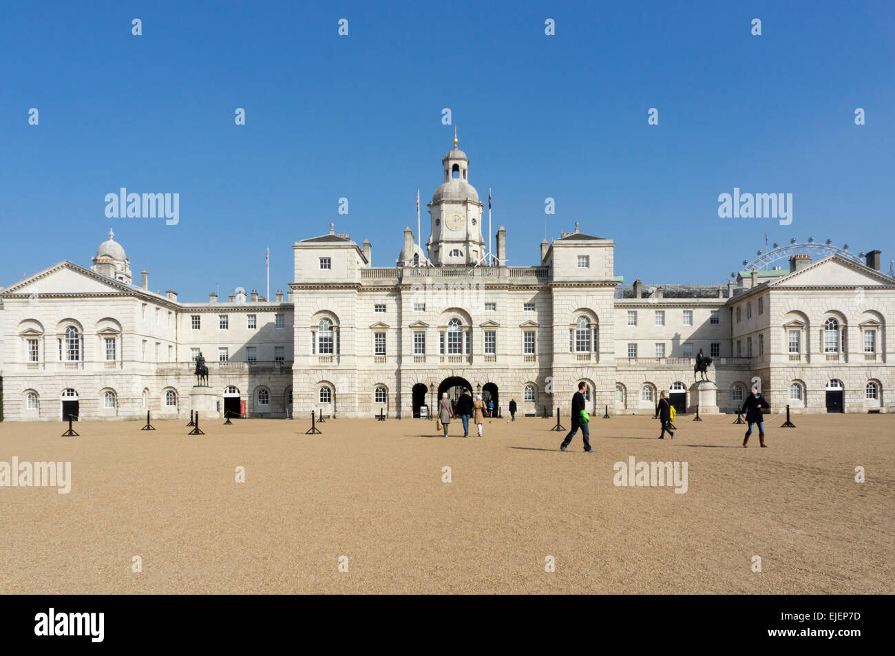 Visitors walking across Horseguards Parade parade ground in Whitehall, central London. Stock Photo