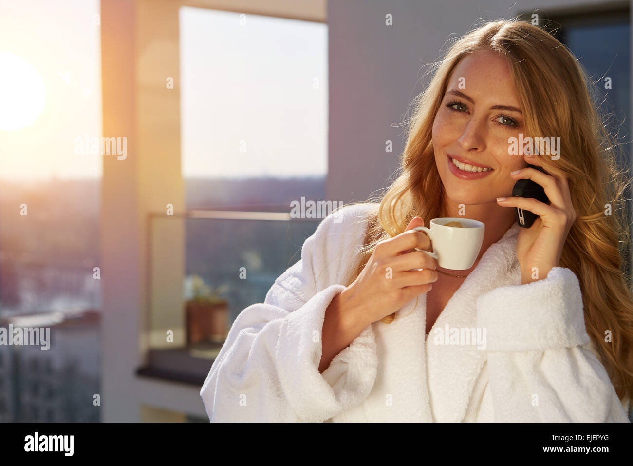 Drinking coffee at home Stock Photo - Alamy