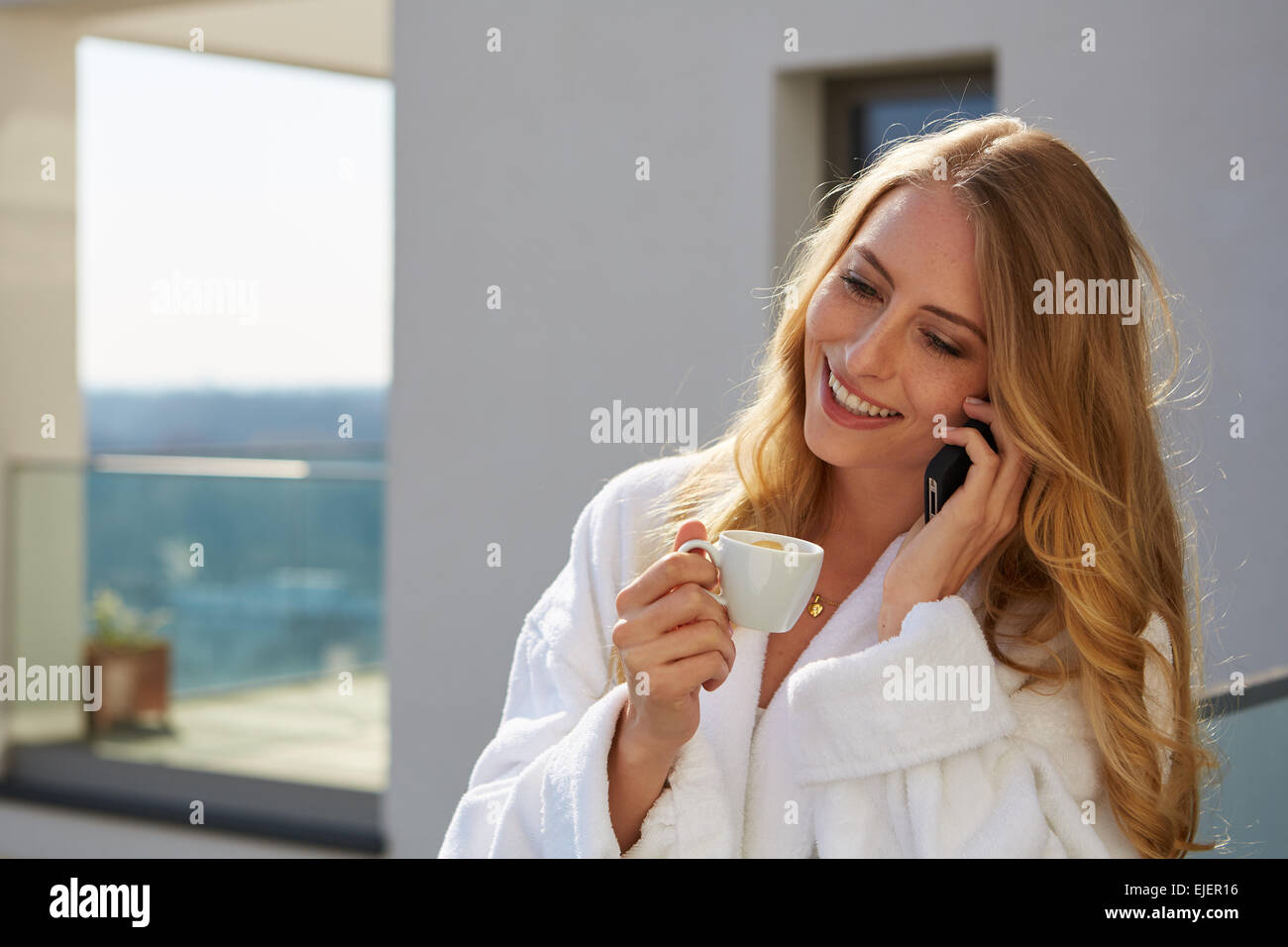 Drinking coffee at home. Stock Photo