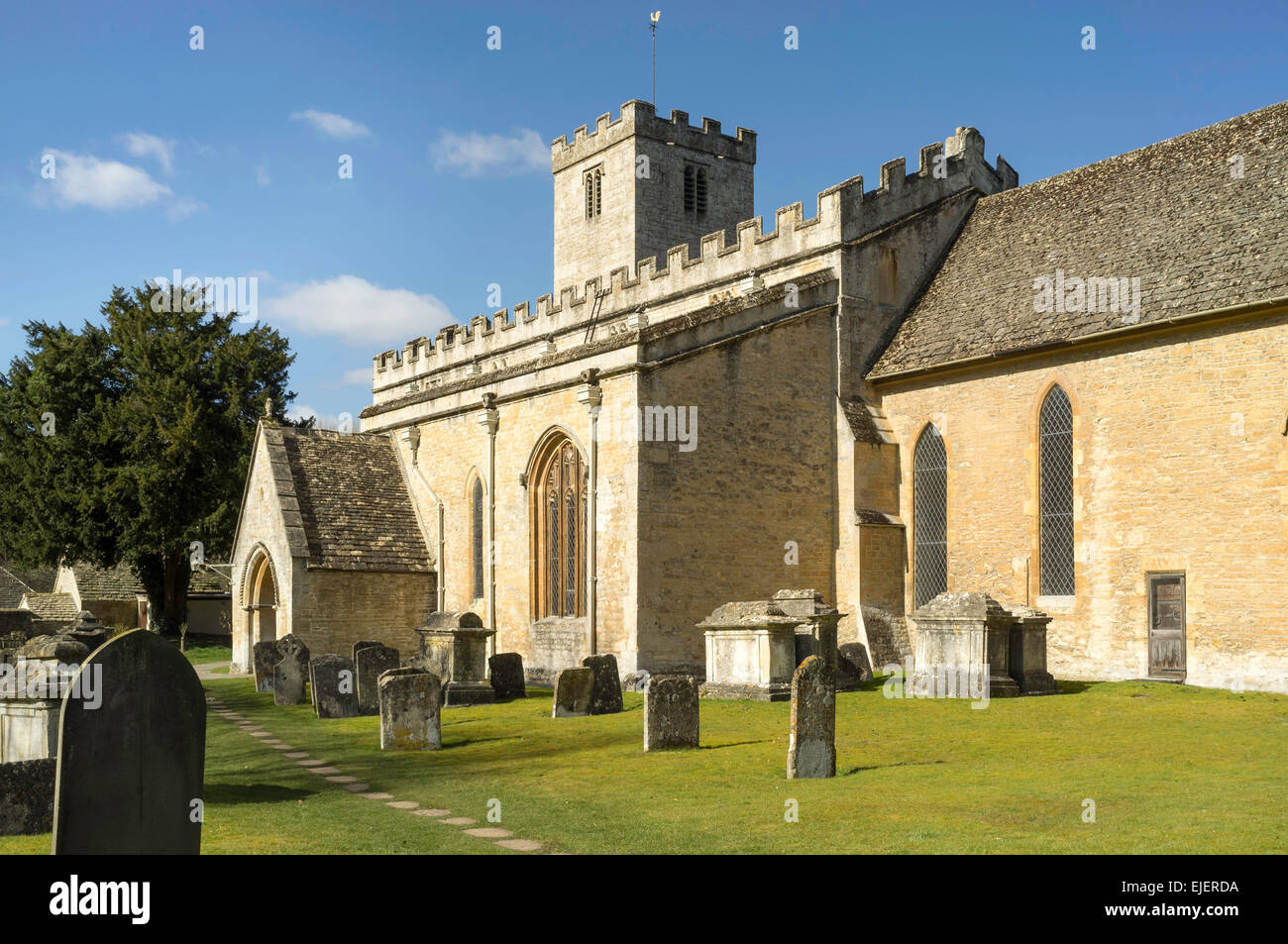 Cotswold churchyard in spring sunshine Stock Photo Alamy