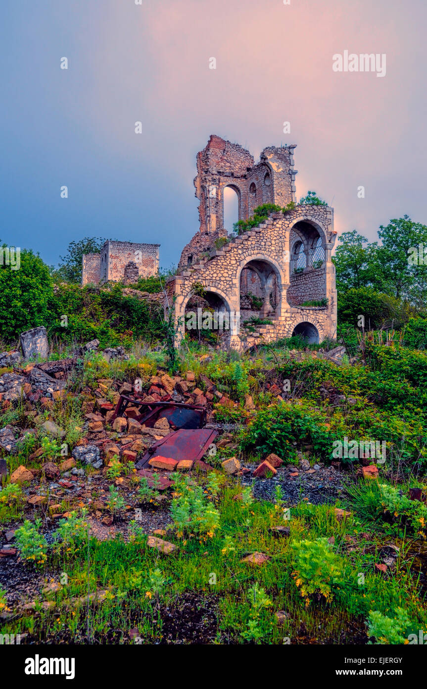Ruins of old villa in mountainous Karabakh destroyed by war Stock Photo