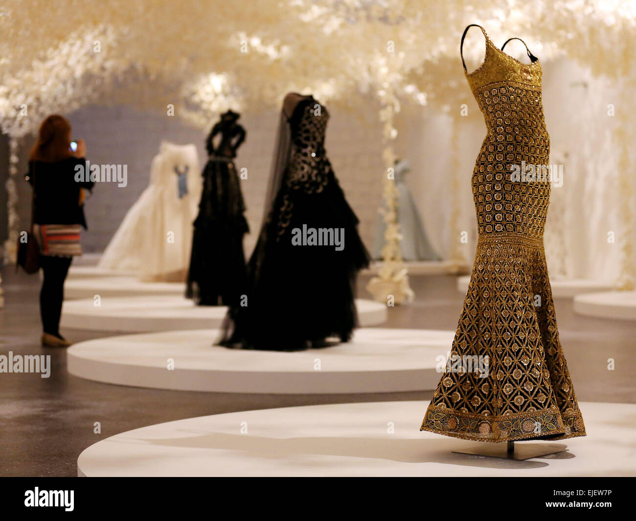Bonn, Germany. 25th Mar, 2015. Design for dresses from the 90s for the  fashion label Chanel by Karl Lagerfeld can be seen in the Bundeskunsthalle  in Bonn, Germany, 25 March 2015. The