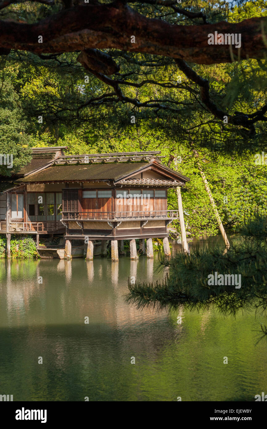 The Uchihashi-tei tea house seen across the pond on a summer's morning at Kenrokuen Garden. Stock Photo