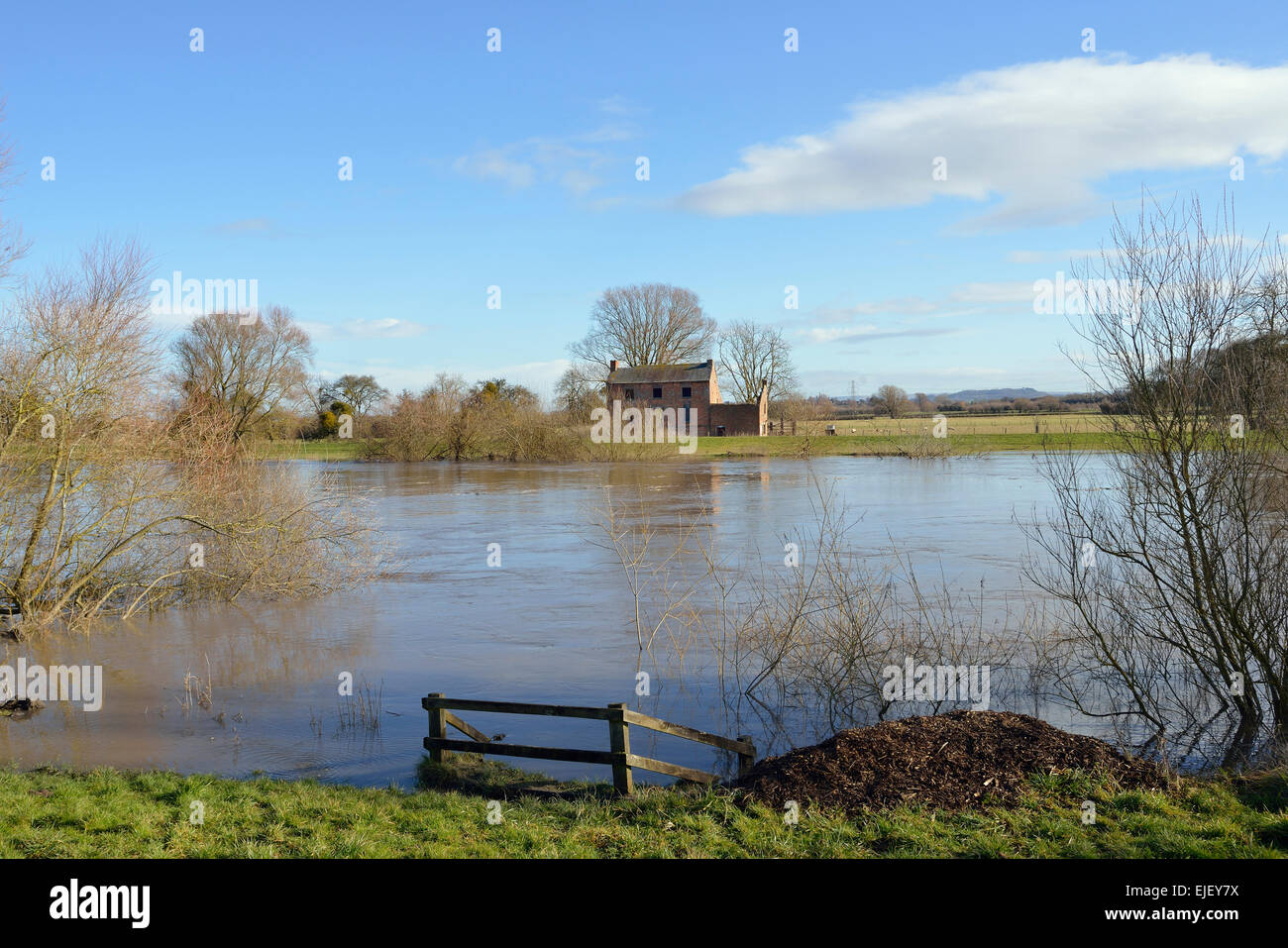 Abandoned House by River Severn after Severn Bore had past. Weir Green
