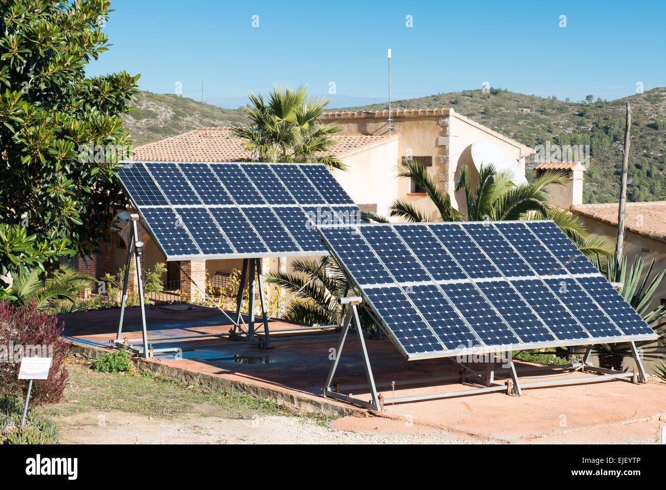 Two large solar panels in a garden in Spain Stock Photo Alamy