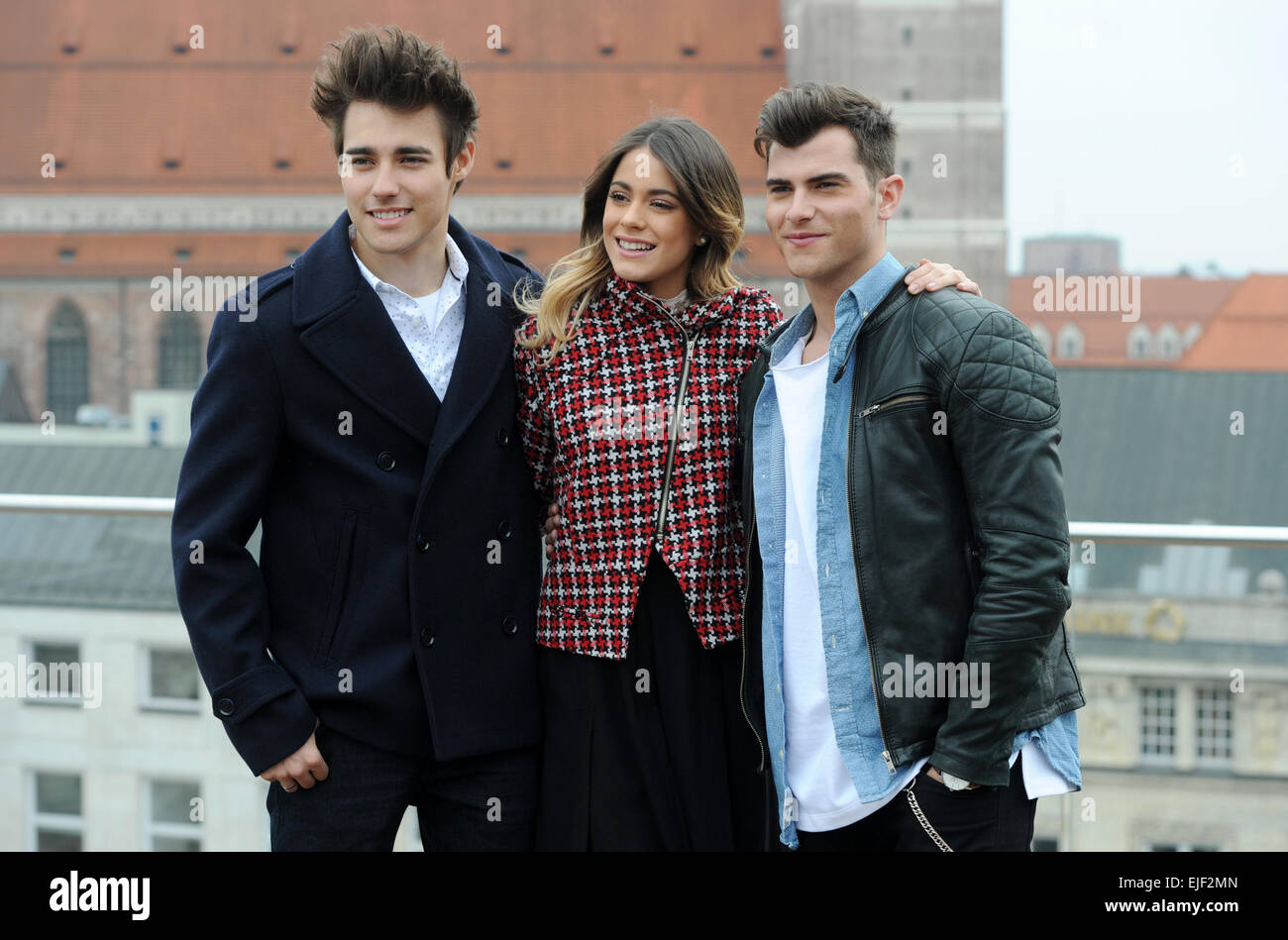 Munich, Germany. 25th Mar, 2015. Actors Jorge Blanco (l-r) (Mexico, as Leon), Martina Stoessel (Argentina, as Violetta) and Diego Dominguez (Spain, as Diego) pose during a press event on the roof of a hotel in Munich, Germany, 25 March 2015. The actors are promoting the new Disney TV show 'Violetta' in Germany. PHOTO: TOBIAS HASE/dpa/Alamy Live News Stock Photo