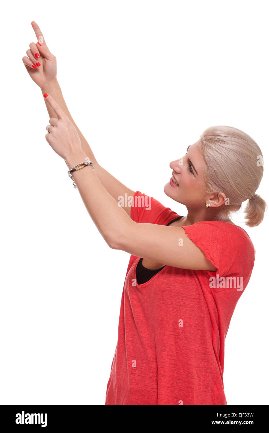 Close up Happy Young Blond Woman Pointing on Upper Right with Both her Hands. Isolated on White Background Stock Photo