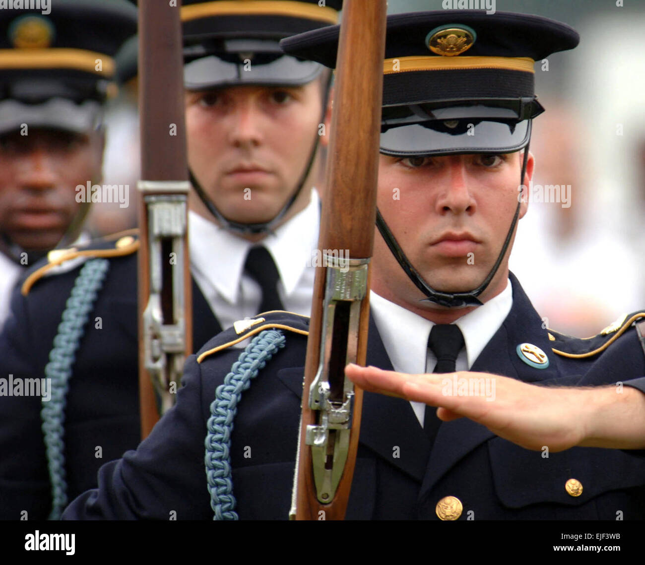 U.S. Army soldiers from the 3rd United States Infantry Regiment Old Guard Drill Team performs their precision drill movements at the Fort Eustis, Va., Super Day festival on Aug. 11, 2006.  The Super Day festival is a chance to show appreciation to soldiers, family, friends, and the civilian workforce in the Fort Eustis community.   Petty Officer 2nd Class Justin K. Thomas, U.S. Navy.  Released Stock Photo