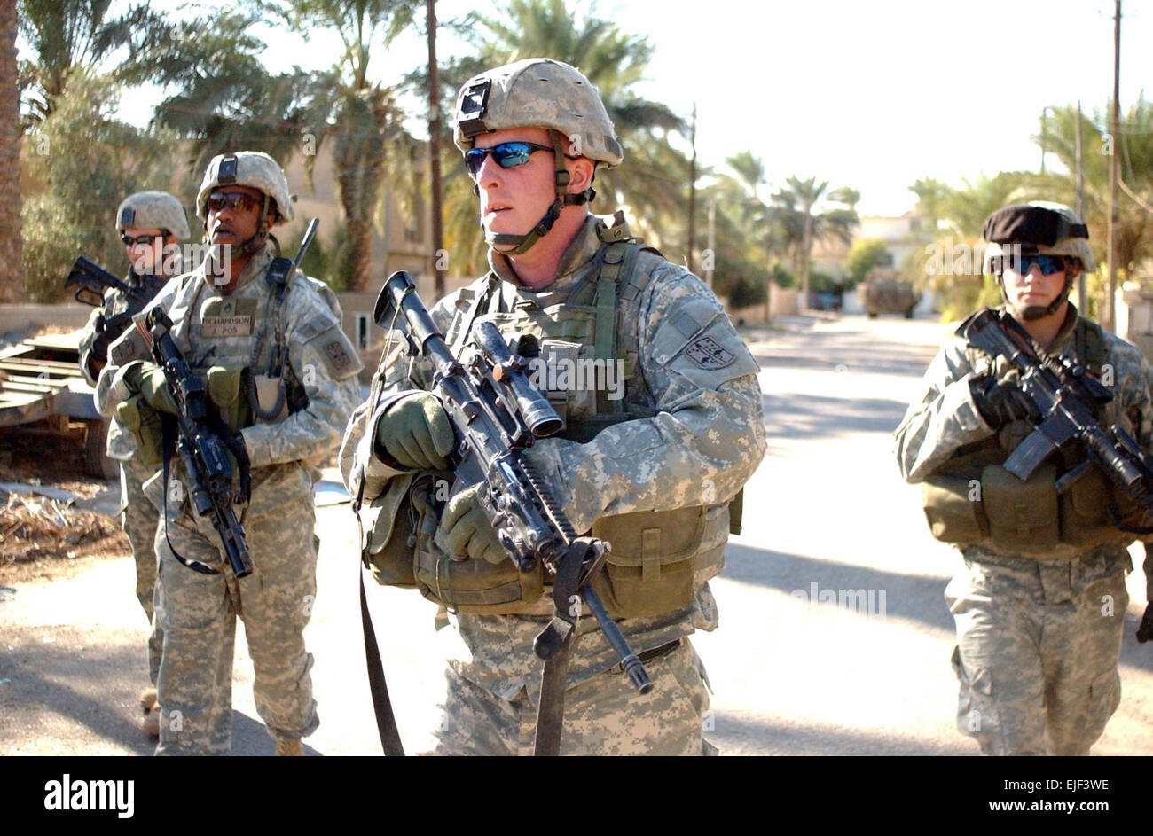 U.S. Army Soldiers from 2nd Battalion, 1st Infantry Regiment, 172nd Stryker Brigade Combat Team conduct a patrol in Mushada, Iraq, Nov. 17, 2006.  Spc. Jeffrey AlexanderReleased Stock Photo