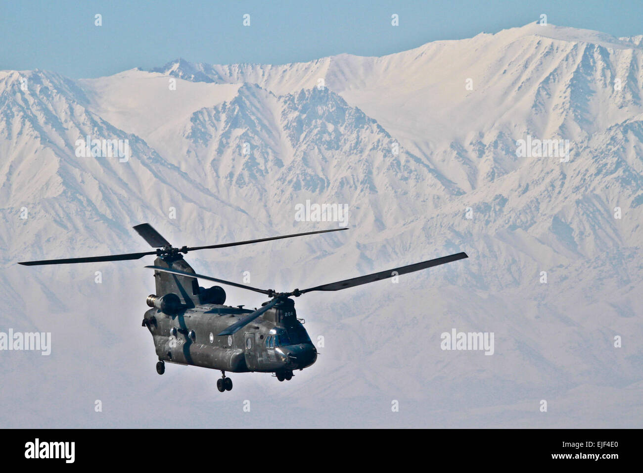 A U.S. Army CH-47 Chinook heavy lift helicopter lifts off from Bagram Air Field, Afghanistan, Feb. 29, 2012. Stock Photo