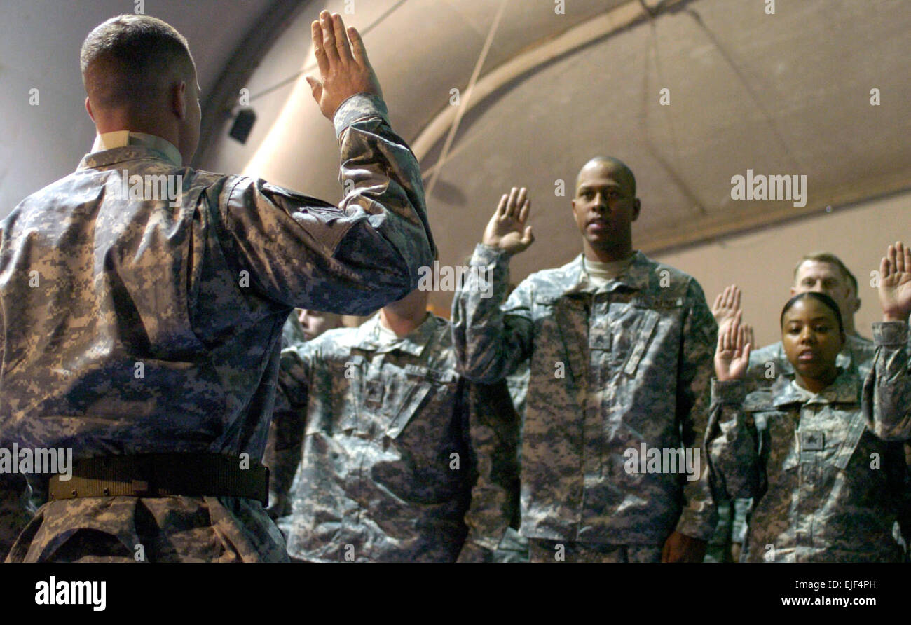 071208-A-7186W-001 – Soldiers from CJTF-82’s Task Force Gladius recite the Oath of the Noncommissioned Officer during their induction into the NCO Corps here today.   Sgt. Jim Wilt, CJTF-82 Public Affairs Stock Photo