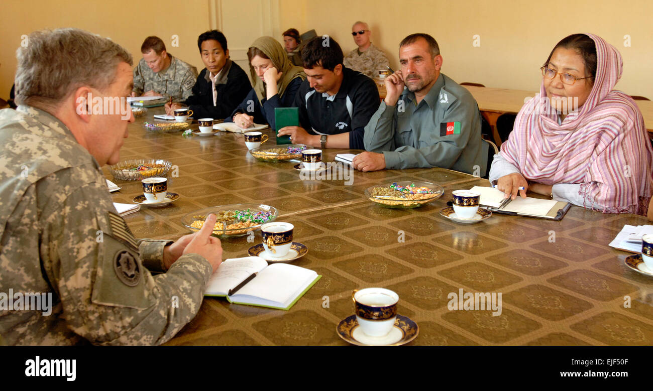 Lt. Gen. Douglas Lute, assistant to the President George W. Bush and Deputy National Security Advisor for Iraq and Afghanistan, meet with Afghanistan’s only female governor, Bamyan province Governor Habiba Sorabi, at the governor’s palace, and descusses the needs of the province and the progress they have made with the local provincial reconstruction team, Bamyan province, Afghanistan, May 9. Stock Photo