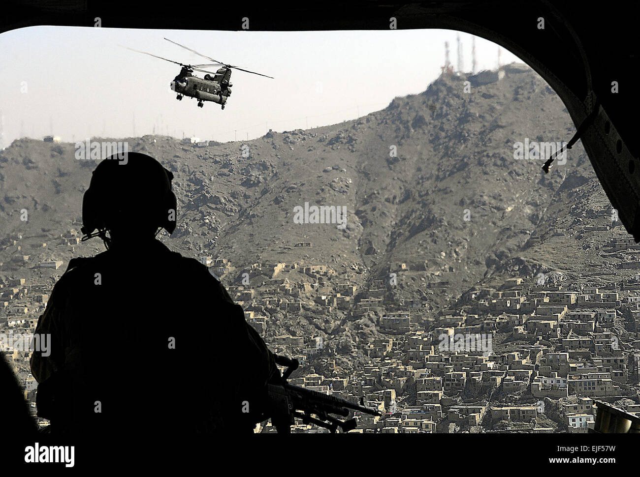 A CH-47 Chinook helicopter flies over Kabul, Afghanistan, June 4, 2007.   Cherie A. Thurlby. Released Stock Photo