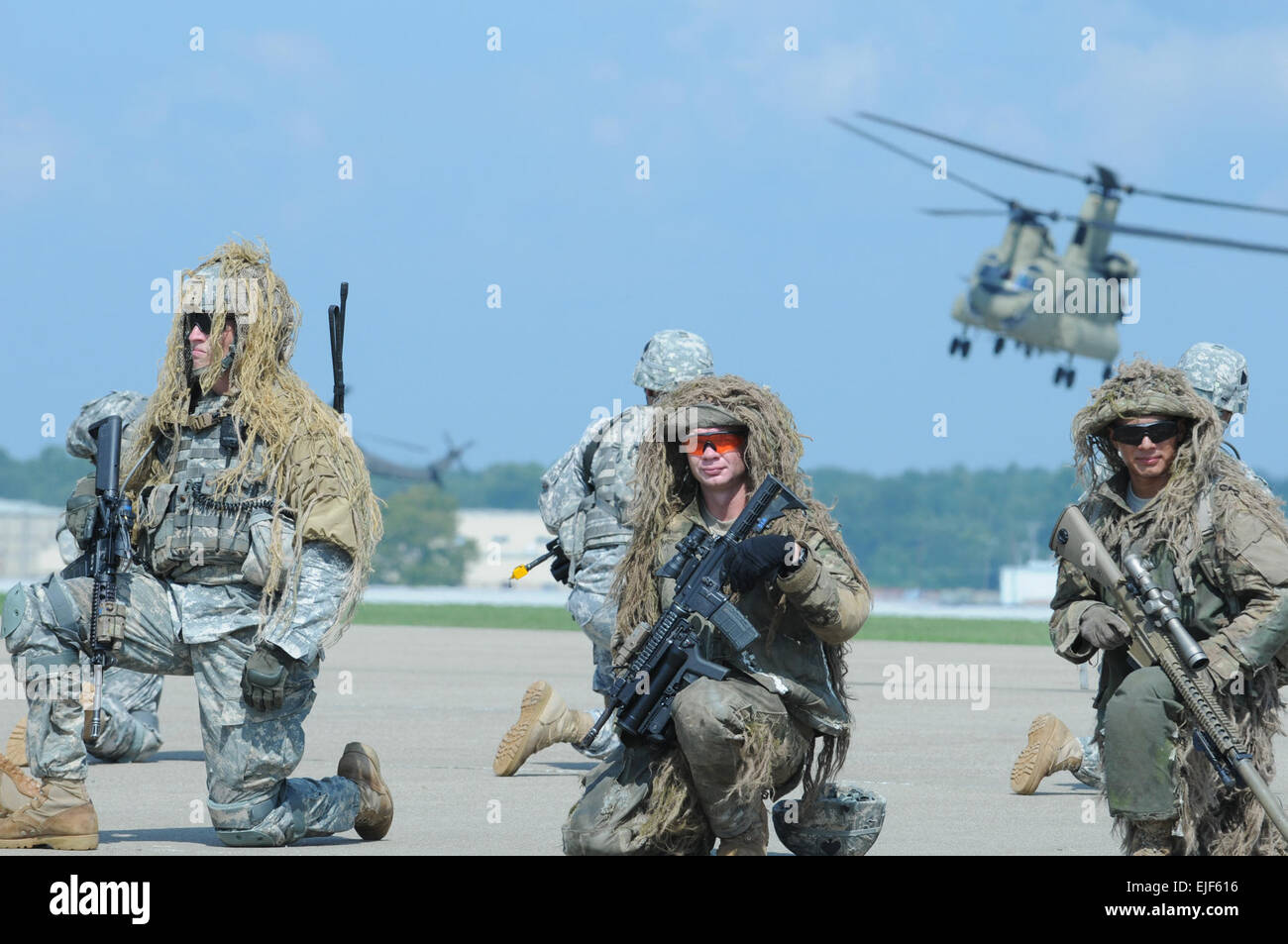 Soldiers Wearing Ghillie Suits Take A Knee As A Ch 47 Chinook Helicopter Flies Overhead At Campbell Army Air Field Tuesday During A Dress Rehearsal For The Upcoming Air Show The Air Assault Soldiers Wearing Ghillie Suits Take A Knee As A Ch 47 Chinook Helicopter Flies Overhead At Campbell Army Air Field Tuesday During A Dress Rehearsal For The Upcoming Air Show The Air Assault