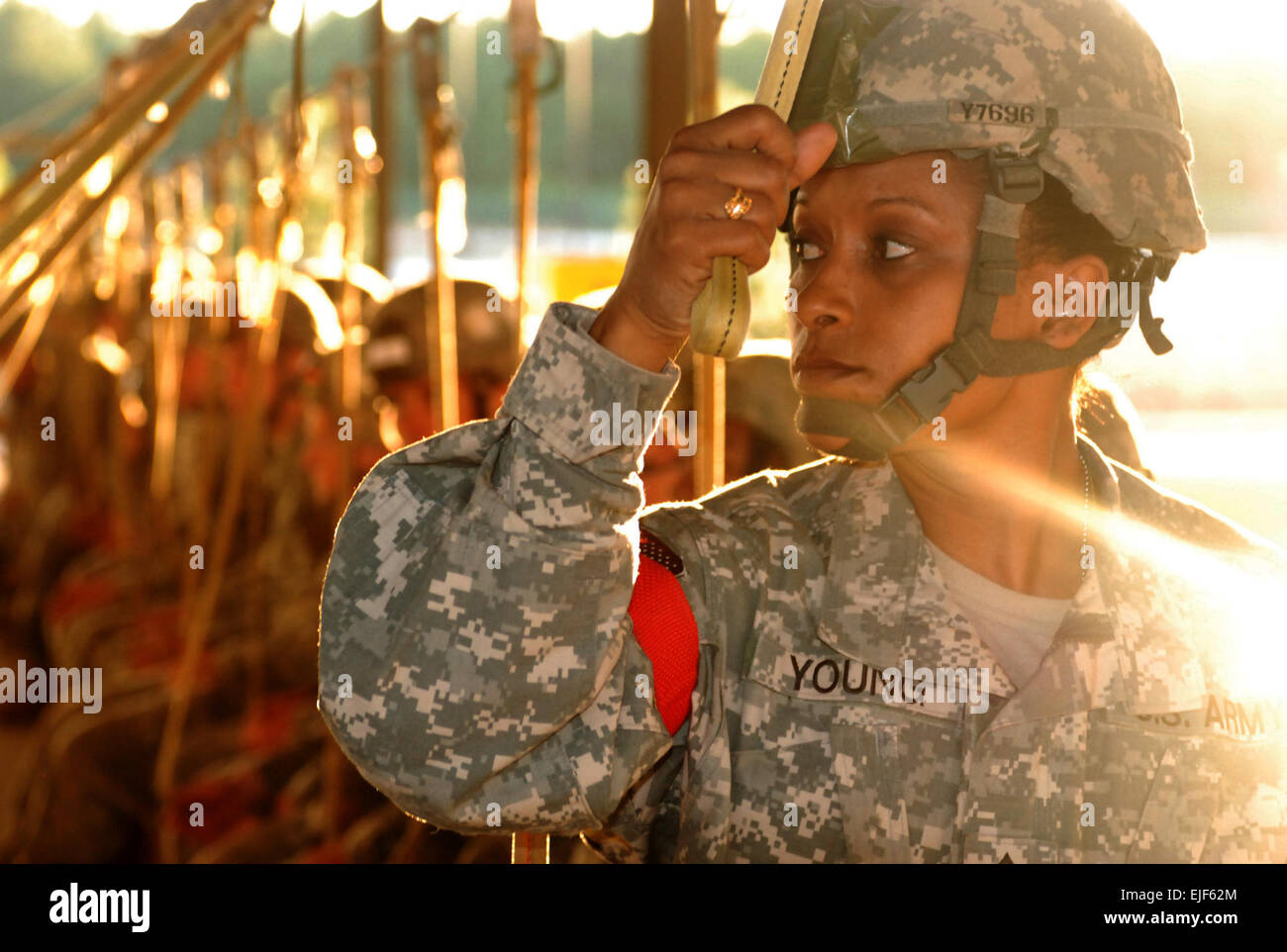 090129-A-6267W-149.JPG Sgt. 1st Class Maria Young, a jumpmaster from Company E, 1st Battalion, 325th Airborne Infantry Regiment, 2nd Brigade Combat Team, 82nd Airborne Division, conducts mock-door training prior to the brigades Joint Force Entry Exercise on Jan. 29. Mock door training is to help familiarize Paratroopers with the door of the aircraft before a jump. Pfc. Bryan Willis, 82nd Abn. Div. PAO Stock Photo
