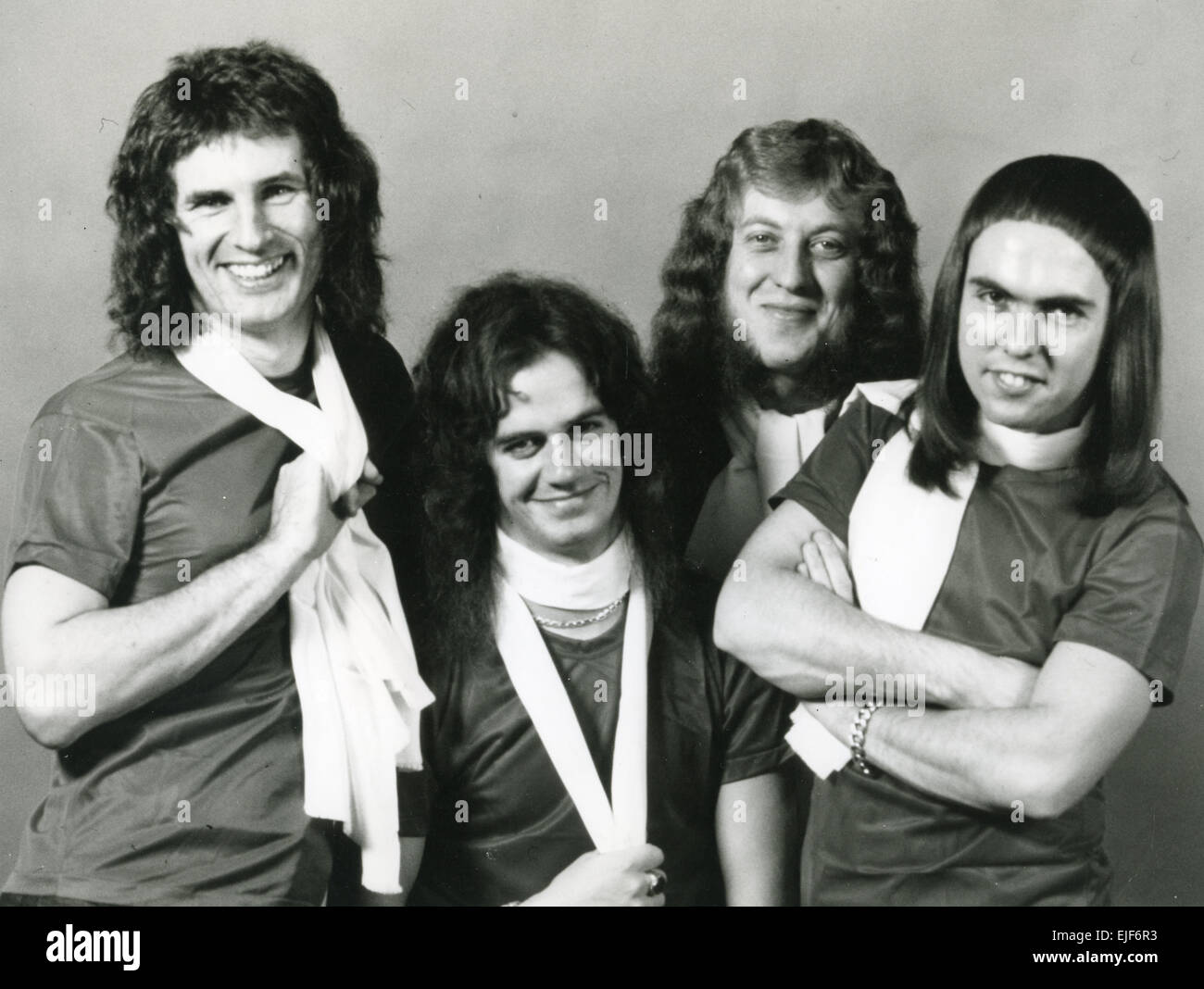 SLADE UK pop rock group about 1970 from left: Don Powell, Jim Lea, Noddy  Holder, Dave Hill Stock Photo - Alamy