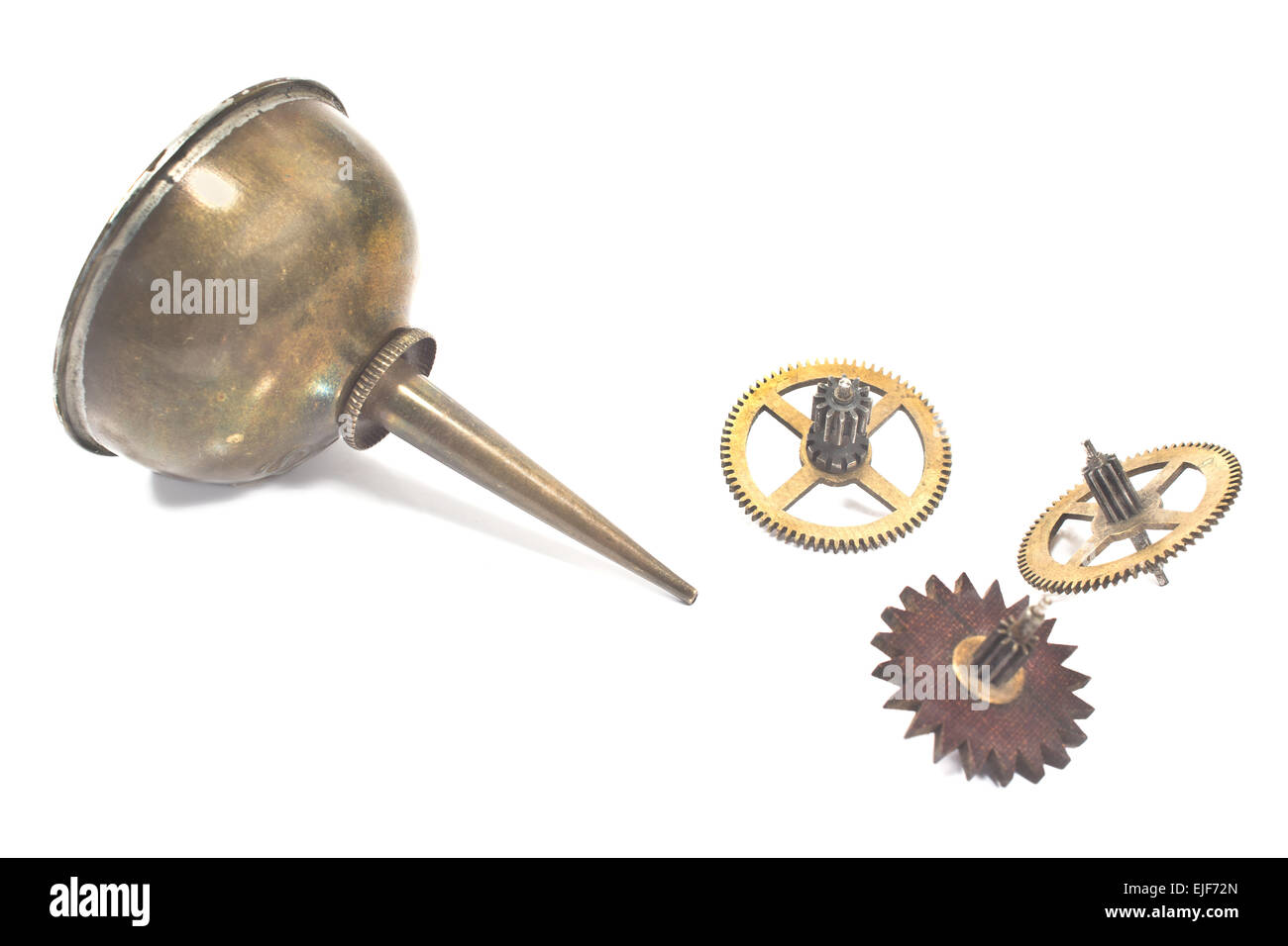 Vintage oil can dropper with cogwheels gears isolated on white Stock