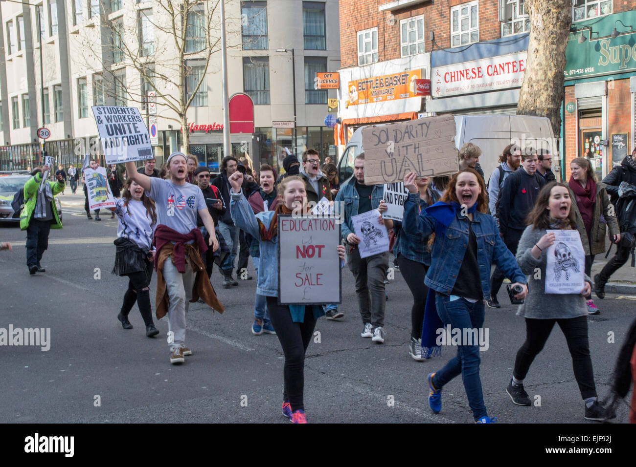 London, UK.  25th March, 2015. Students, education workers and supporters marched from London School of Economics (LSE) to the London College of Communication (LCC) in Elephant and Castle, under the banner of ‘March to stop the cuts at UAL: free education for all’ The demonstration is aimed primarily at protesting a series of devastating cuts to Foundation courses at UAL, but is also themed around a broader fight for free and democratic education. The march will demand that the cuts are cancelled, Credit:  Paul Mendoza/Alamy Live News Stock Photo