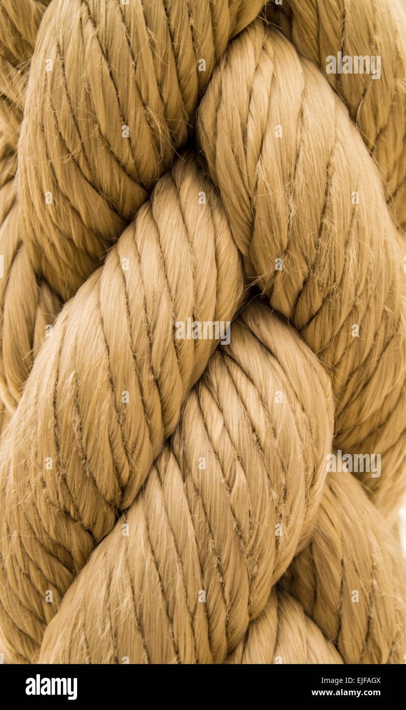 A closeup shot of cream colored rope showing texture and weaving Stock Photo