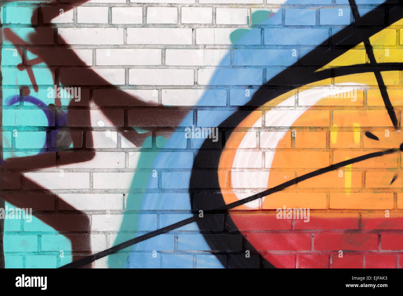 Urban street art on an urban brick wall in a city Stock Photo - Alamy