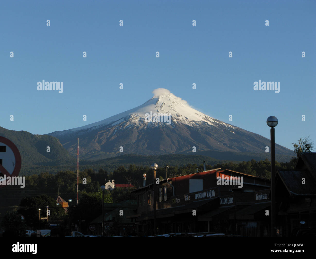 Snow Capped Volcano near town of Villarrica in southern Chile Stock Photo