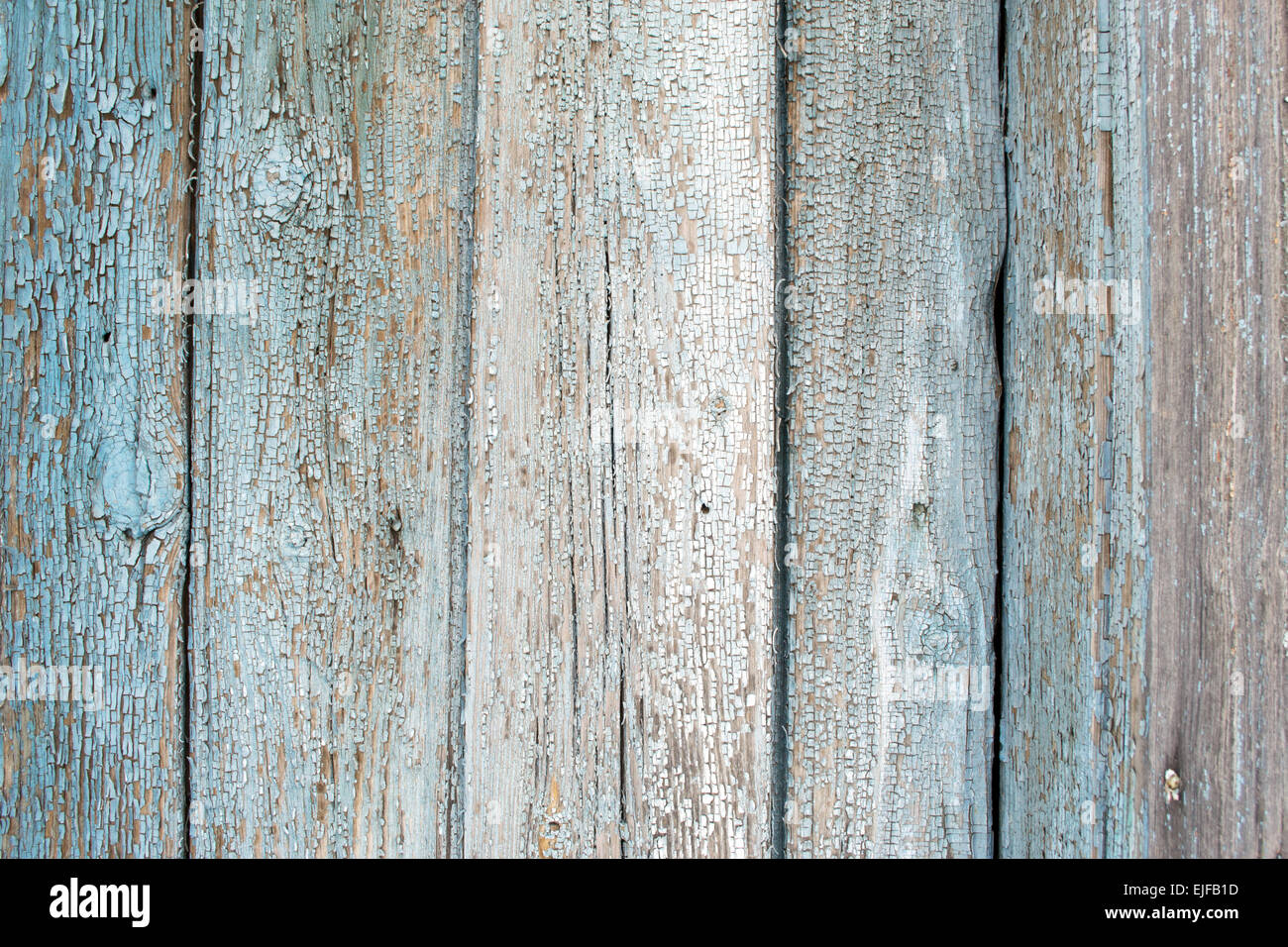 Wooden planks and slats get old as the paint begins to flake off Stock