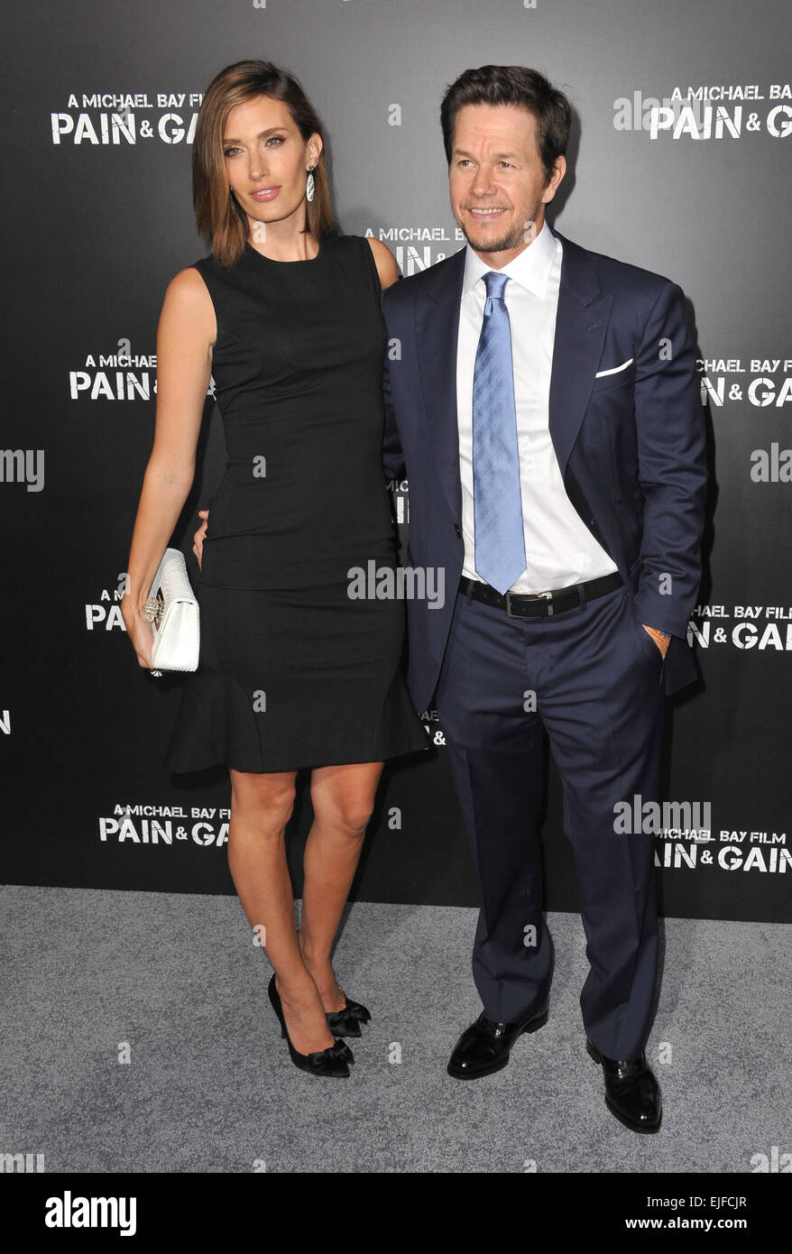 LOS ANGELES, CA - APRIL 22, 2013: Mark Wahlberg & wife Rhea Durham at the Los Angeles premiere of his movie 'Pain & Gain' at the Chinese Theatre, Hollywood. Stock Photo