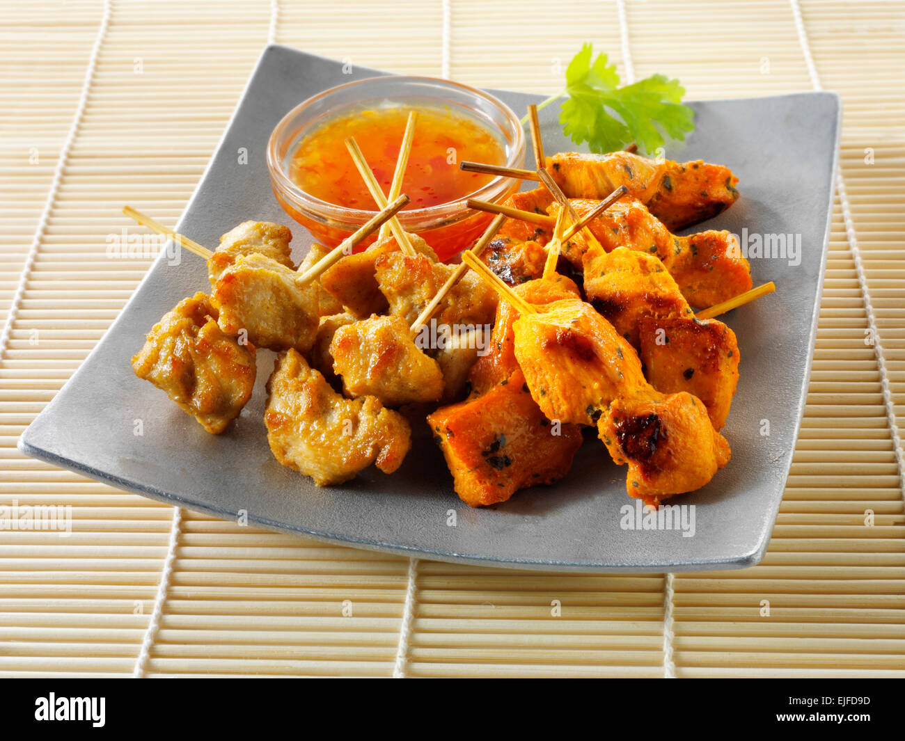Oriental satay with chilli dipping sauce Stock Photo Alamy