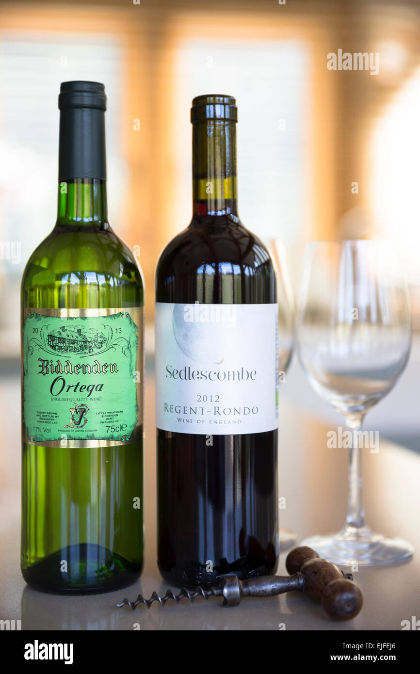 English wine - Bottle of Sedlescombe red wine Regent Rondo and Biddenden Ortega white wine with corkscrew Stock Photo