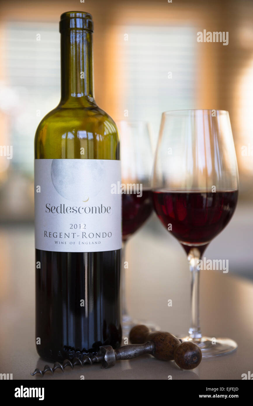 English wine in glass and corkscrew - Bottle of red wine Regent Rondo,vfrom Sedlescombe Vineyard, Kent, Stock Photo