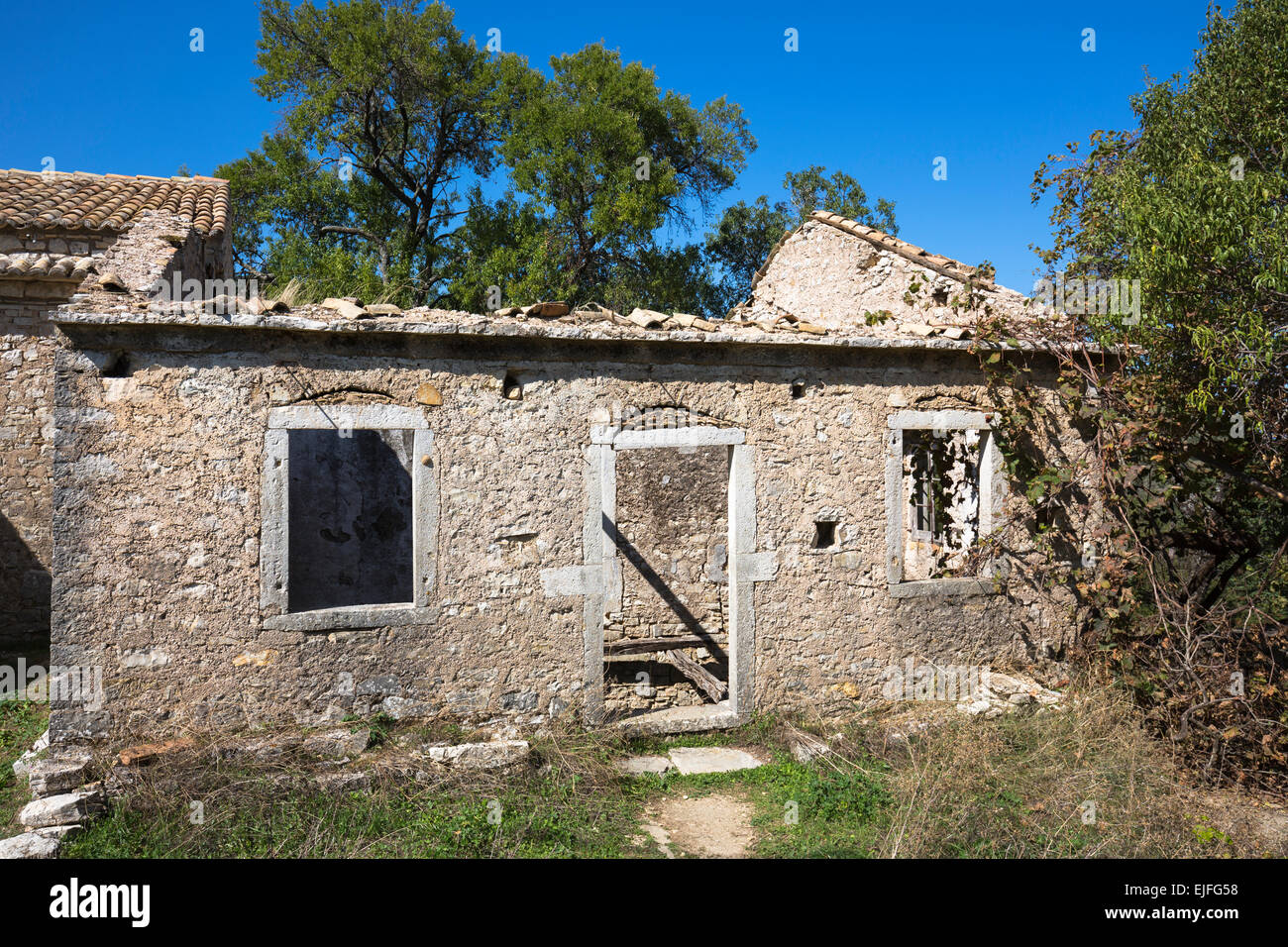 Derelict house ruins in ancient village of Old Perithia Palea
