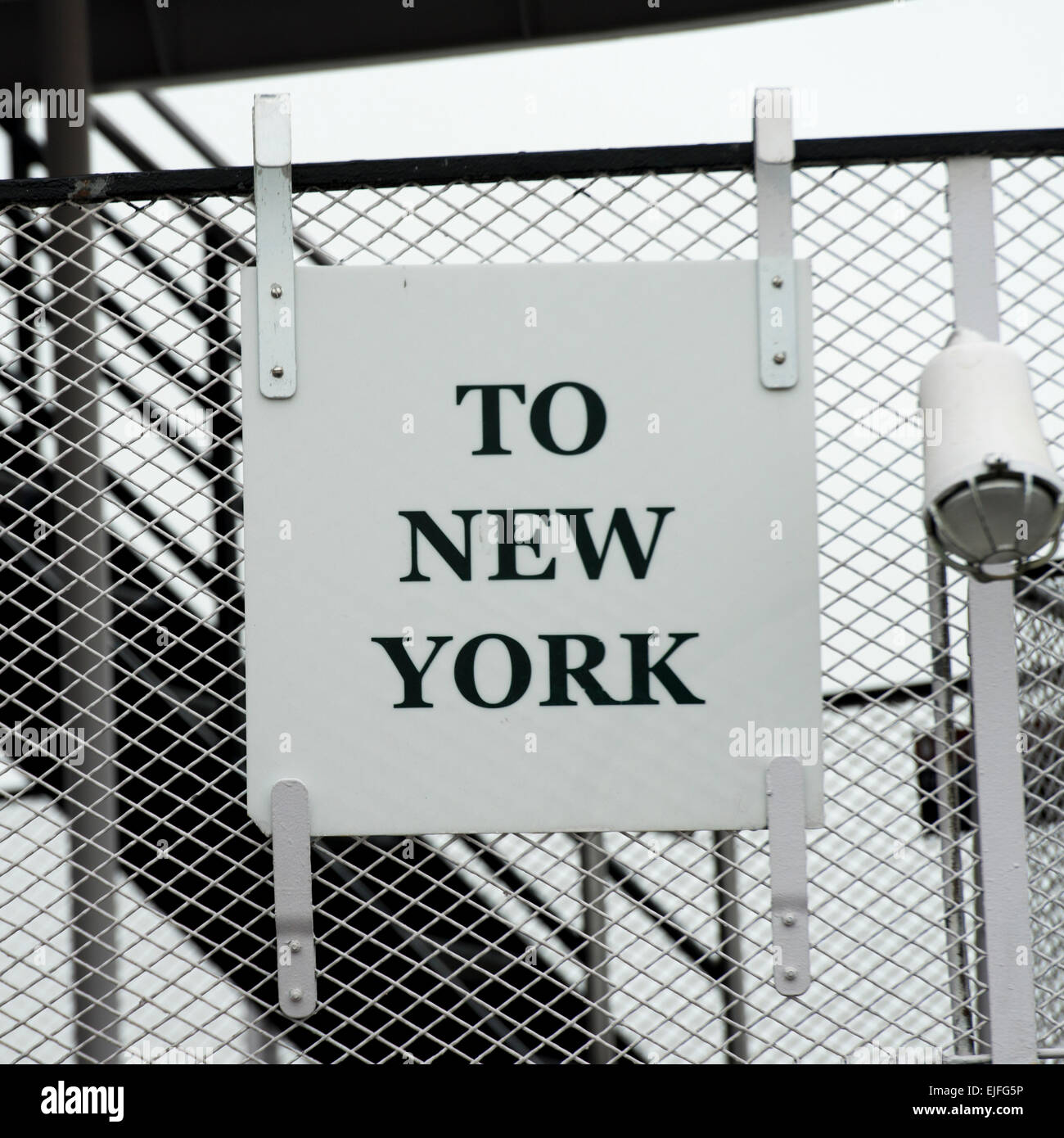 Sign on chainlink fence, Liberty Island, Manhattan, New York City, New