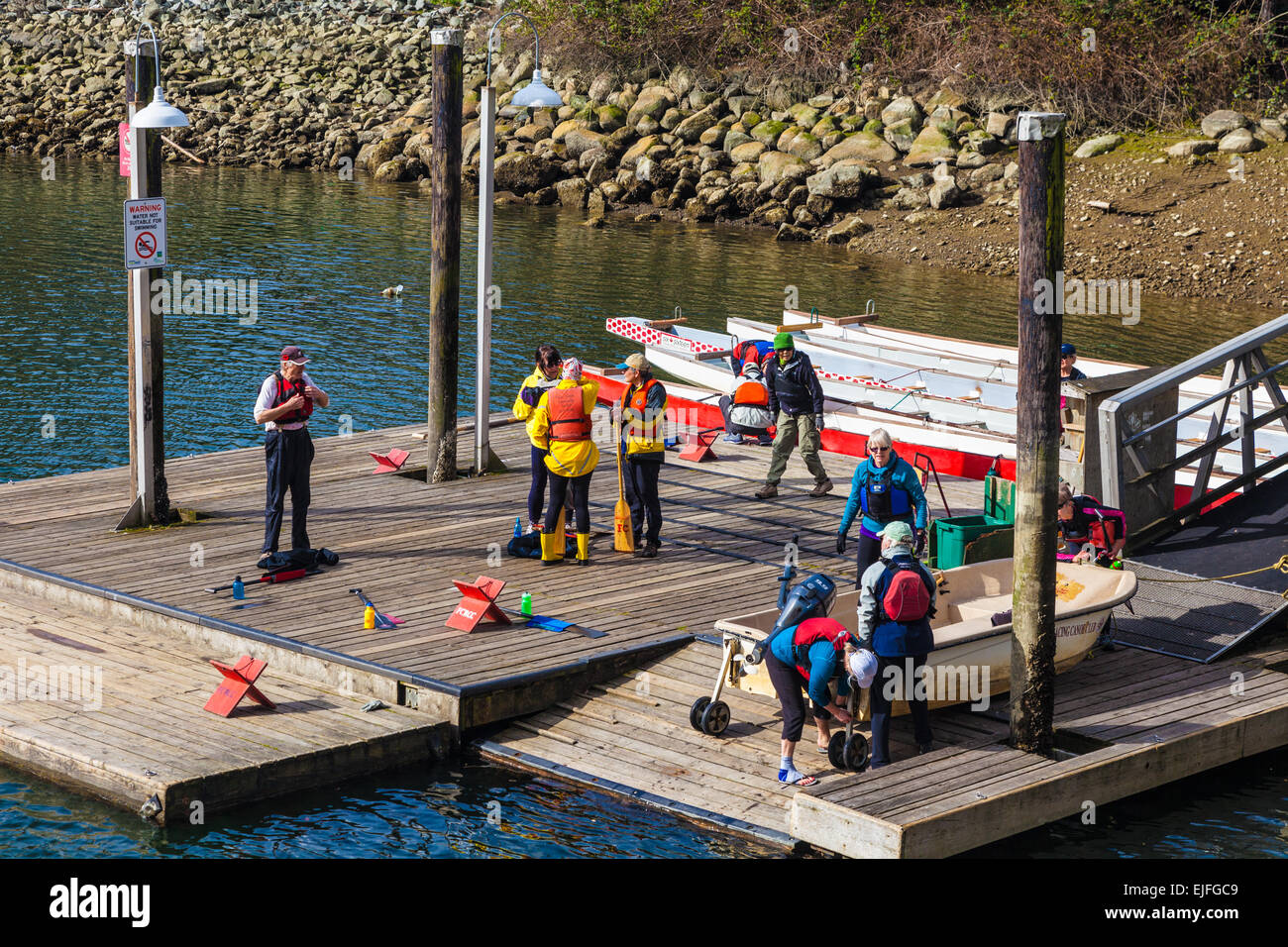 Senior citizens getting ready for a Dragon Boat training session, Granville Island, Vancouver Stock Photo