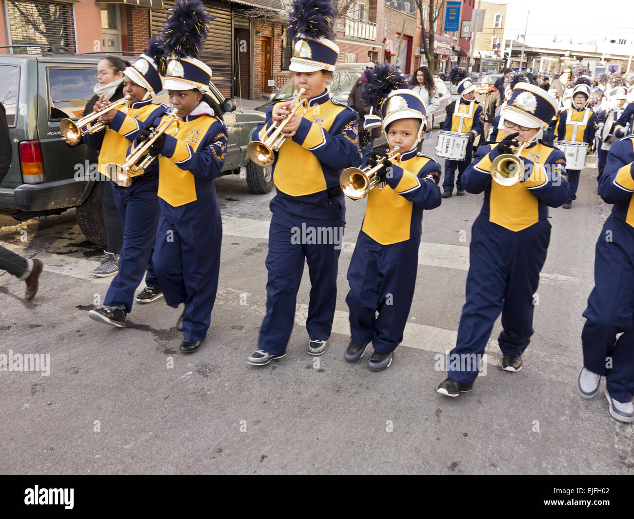 Elementary school marching band in the Three Kings Day Parade in Williamsburg, Brooklyn, NY. Stock Photo
